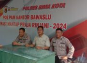 Personel OMP Rinjani 2024 Polres Bima Kota Laksanakan Pengamanan 24 Jam di Kantor KPU dan Bawaslu Kota Bima