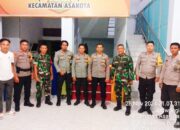 Personel Polres Bima Kota Laksanakan Pengamanan Logistik Pemilukada 2024 di PPK Kecamatan